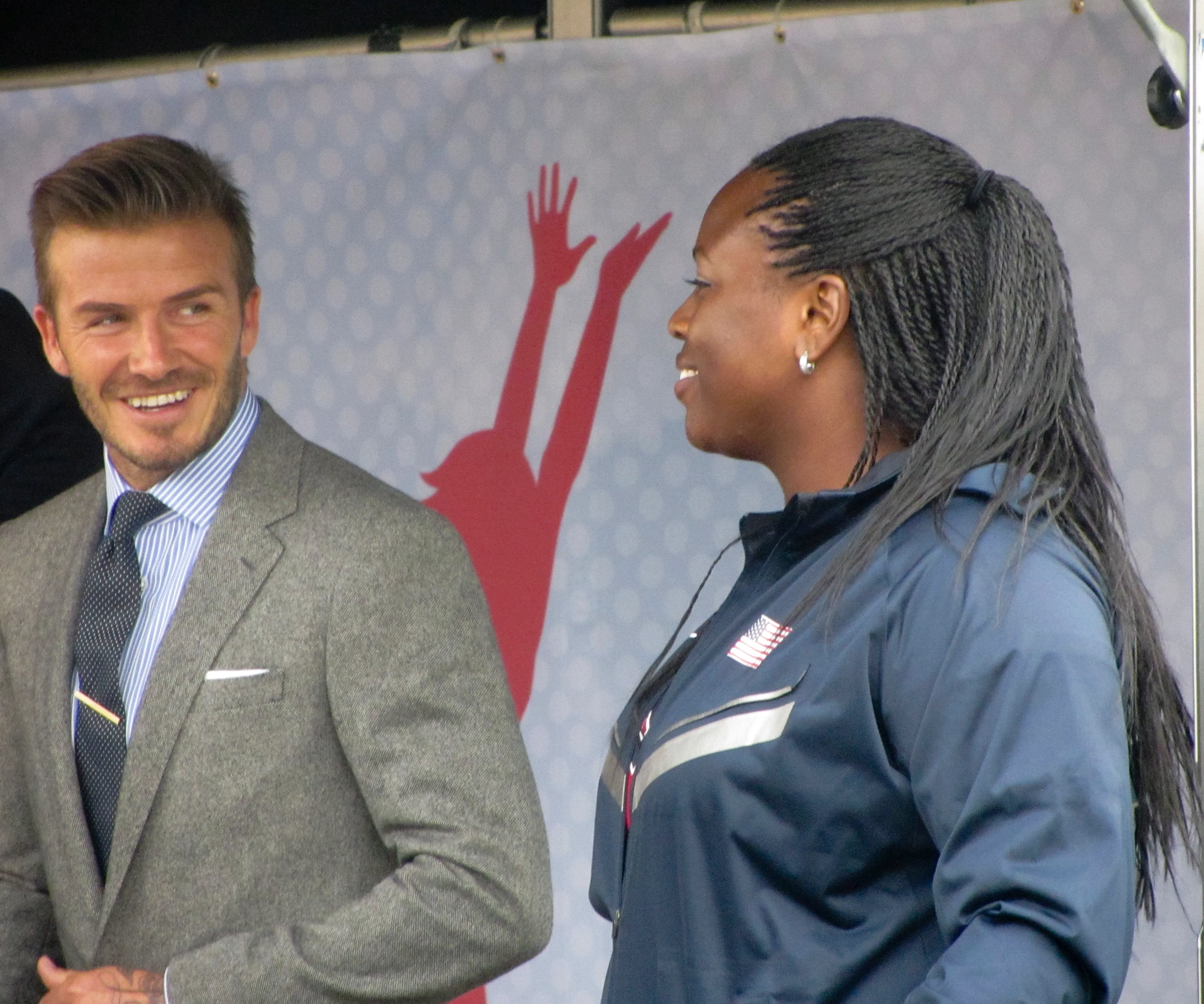 David Beckham at the US Embassy in London in 2012, with a short swept-back top and tidy tapered sides.