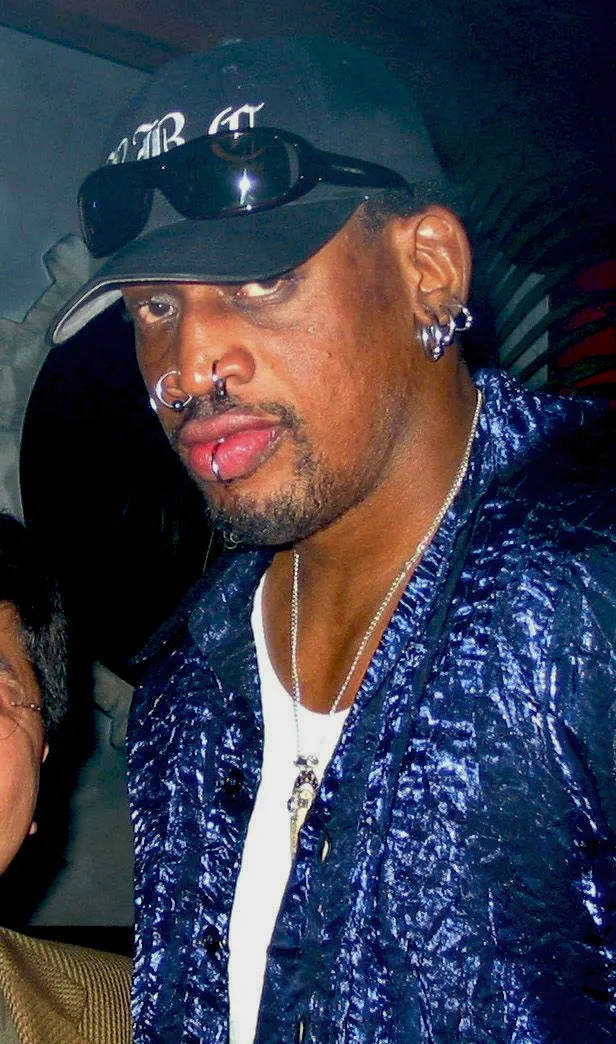 Dennis Rodman in November 2001 wearing a cap that covers his hair.