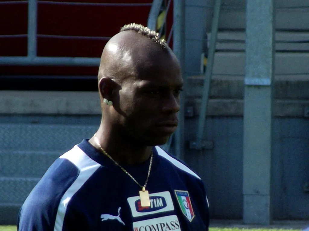 Mario Balotelli at Italy's Euro 2012 training camp with a narrow mohawk.