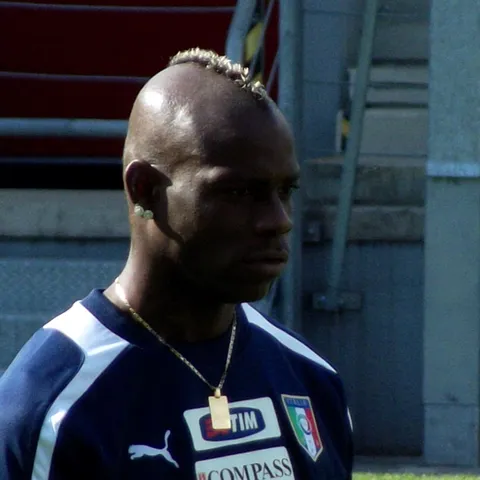 Mario Balotelli at Italy's Euro 2012 training camp with a narrow mohawk.
