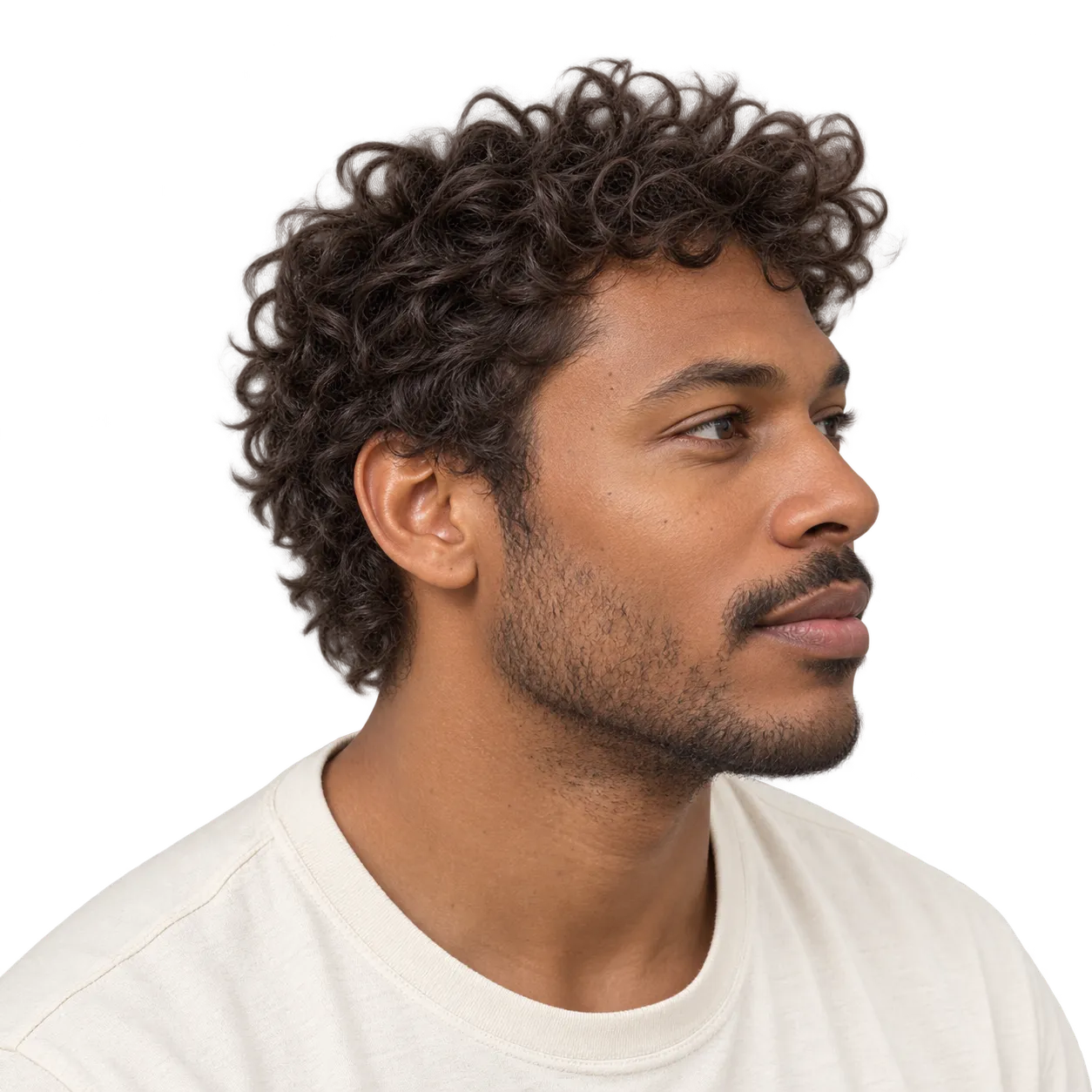 Fictional adult man with a short curly shag, rounded crown volume, close scissor-cut sides, and soft curls retained at the nape, shown in three-quarter view.